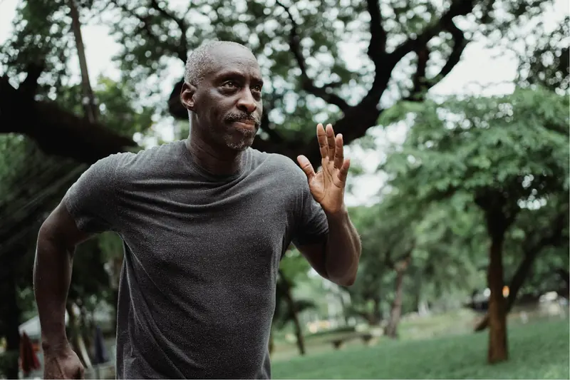 Man exercising outdoors in a park
